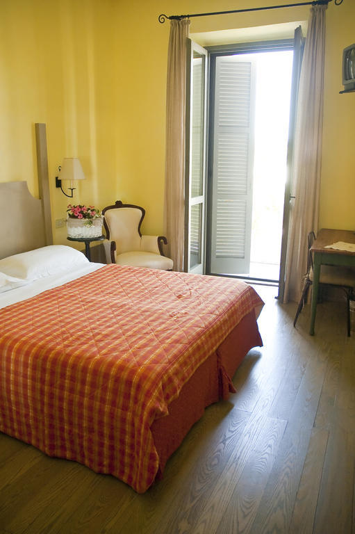 Locanda Delle Mura Anna De Croy Magliano in Toscana Rum bild
